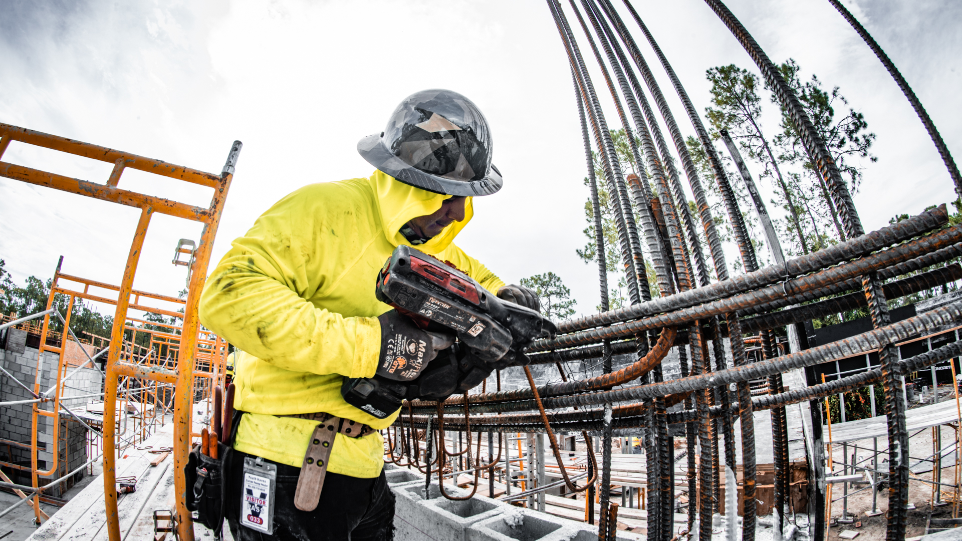 Impact Concrete ironworker tying reinforcing steel for a structural pour